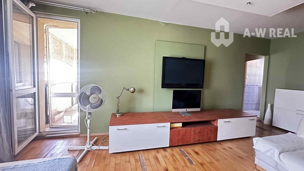 REZERVOVANÉ    PREDAJ    4 izbový byt s balkónom po čiastočnej rekonštrukcii  v kľudnej lokalite na Nám. SNP v Dunajskej Strede