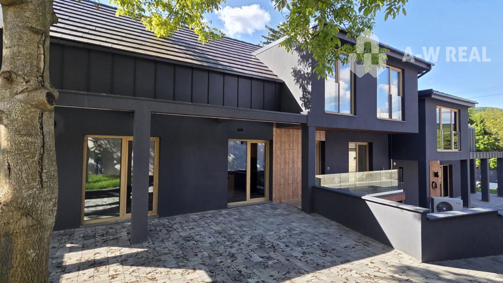 Predám modernú novostavbu polovice poschodového dvojdomu v II. obvode Budapešť, v pokojnej a vyhľadávanej lokalite Budaliget.